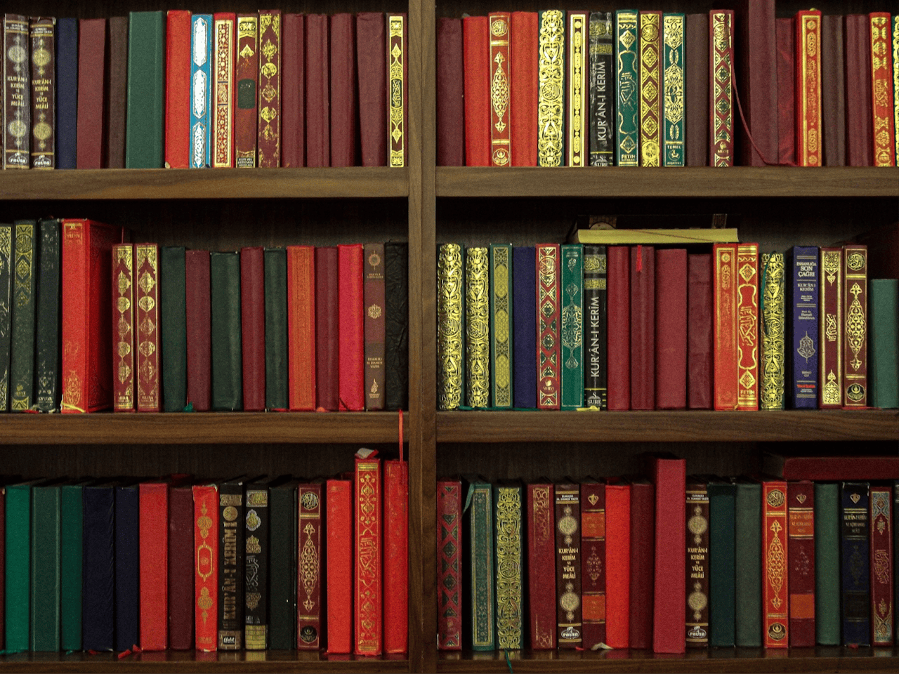 The Art of Drawing Readers In: Your attractive post title goes here A bookshelf filled with colorful and ornate books, showcasing rich diversity and elegance.